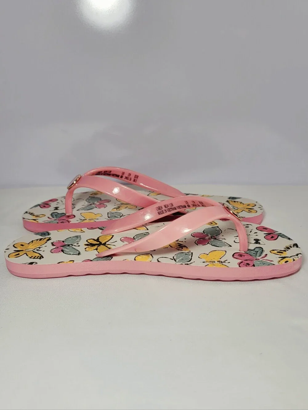 Coach Women's Size 8B  Zayn Pink Butterfly flip flops Slides.
